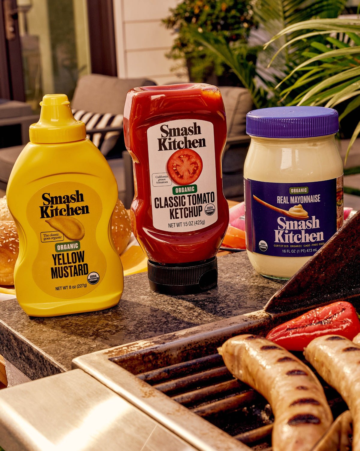 Smash Kitchen products on a grill countertop.